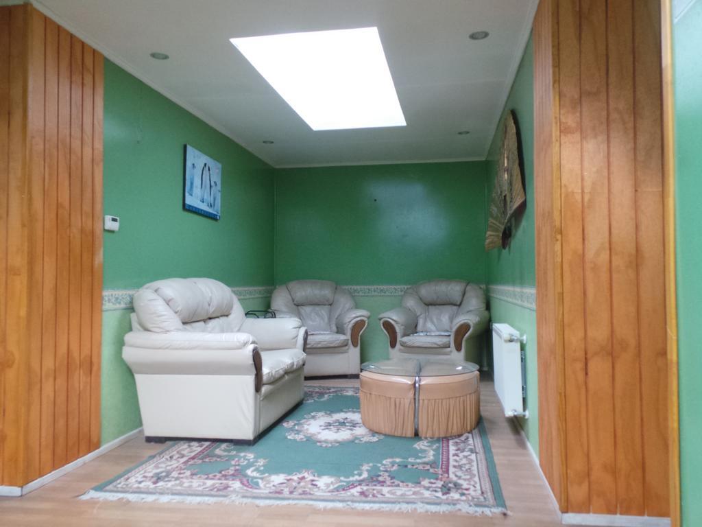 Hostal South Wind I Puerto Natales Bagian luar foto
